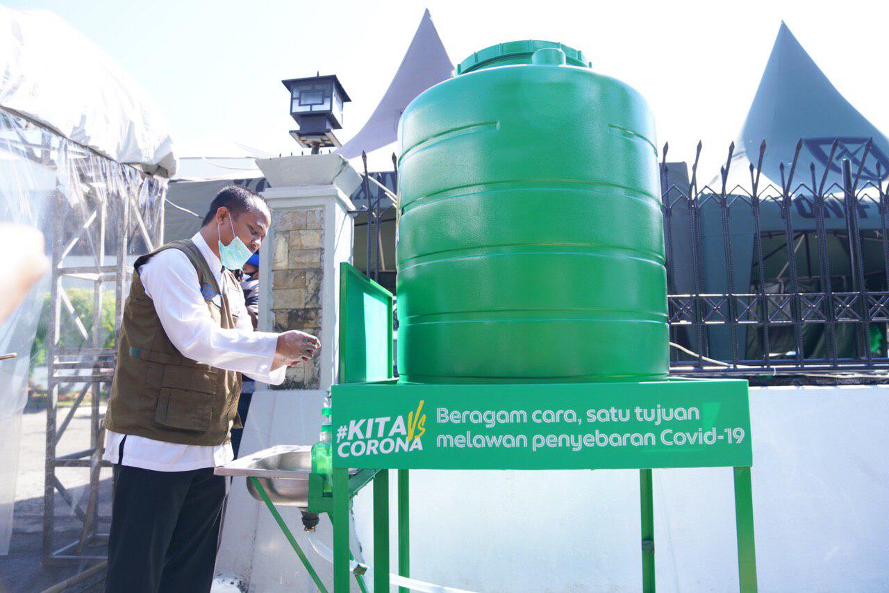 Water Station Grab Disebarkan Diberbagai Titik di Makassar. 